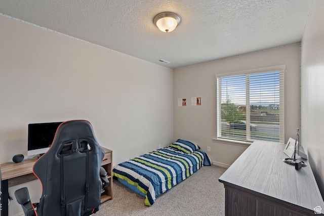 715 N 2560 E, Spanish Fork, UT 84660 - bedroom with carpet flooring, a textured ceiling, and a desk