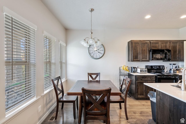 715 N 2560 E, Spanish Fork, UT 84660 - dining space with a chandelier, light wood-style flooring, and recessed lighting