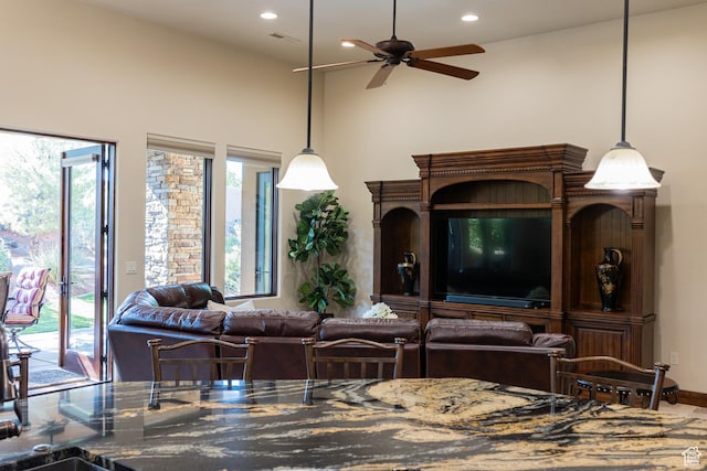 2090 N Tuweap Dr Unit 15, St George, UT 84770 - living room with ceiling fan and recessed lighting