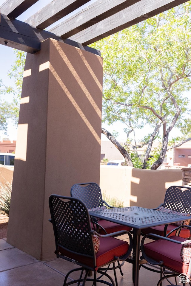 2090 N Tuweap Dr Unit 15, St George, UT 84770 - view of patio with outdoor dining area and a pergola