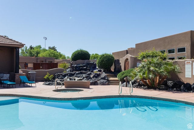 2090 N Tuweap Dr Unit 15, St George, UT 84770 - community pool with a community hot tub and a patio