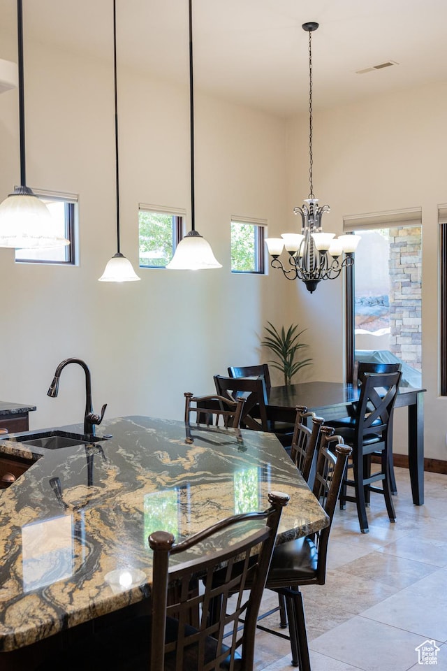 2090 N Tuweap Dr Unit 15, St George, UT 84770 - dining area featuring a chandelier