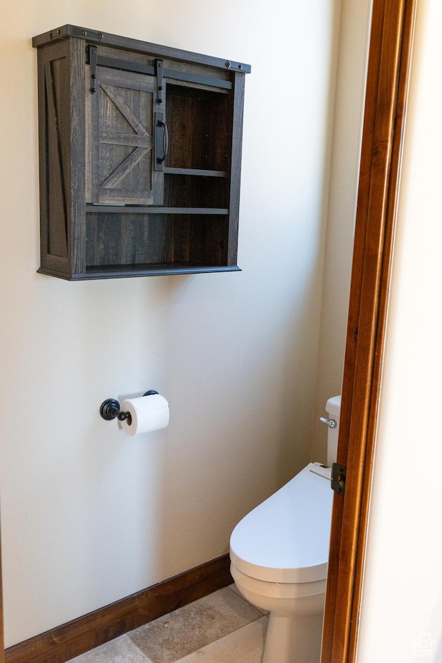2090 N Tuweap Dr Unit 15, St George, UT 84770 - bathroom featuring toilet and baseboards