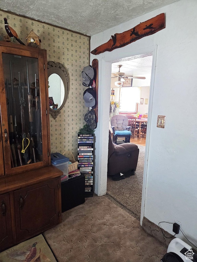 157 E 100 N, Wellington, UT 84542 - corridor featuring carpet, wallpapered walls, and a textured ceiling