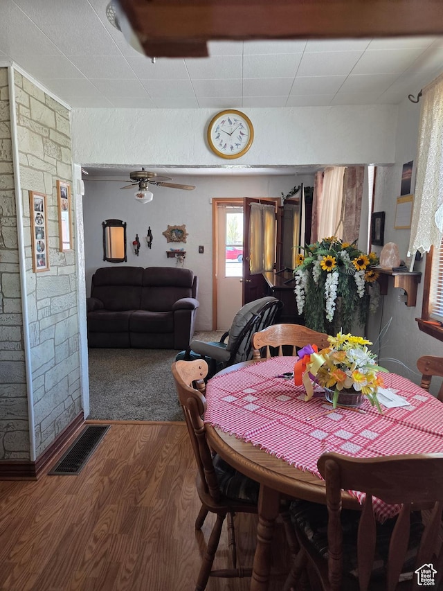 157 E 100 N, Wellington, UT 84542 - dining area with wood finished floors and ceiling fan