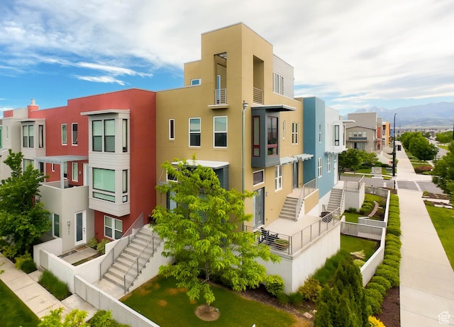 4955 W Daybreak Pkwy, South Jordan, UT 84009 - view of building exterior featuring stairs and a residential view