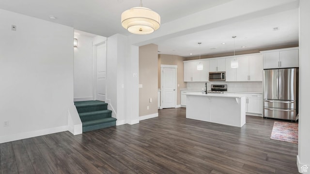4955 W Daybreak Pkwy, South Jordan, UT 84009 - kitchen featuring appliances with stainless steel finishes, dark wood-style flooring, light countertops, white cabinets, and recessed lighting