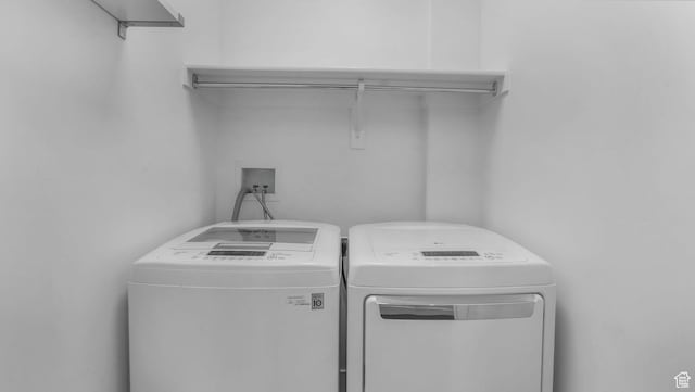 4955 W Daybreak Pkwy, South Jordan, UT 84009 - washroom featuring washing machine and clothes dryer