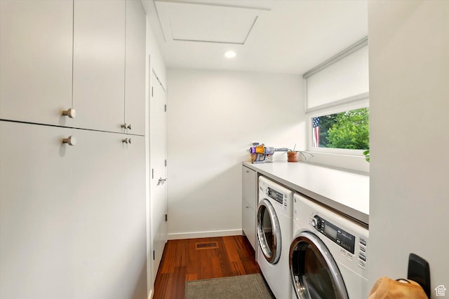 laundry area featuring cabinet space, washing machine and dryer, dark wood finished floors, baseboards, and recessed lighting