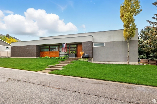contemporary house featuring stucco siding