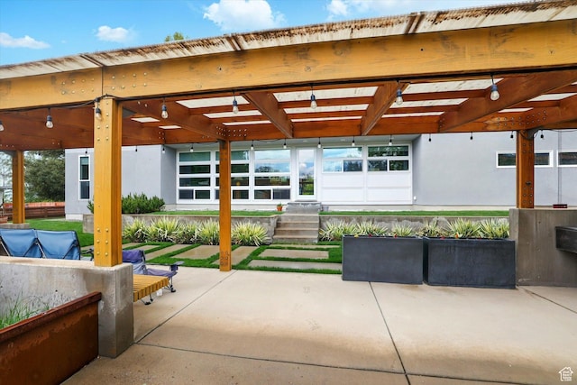 view of patio featuring a pergola