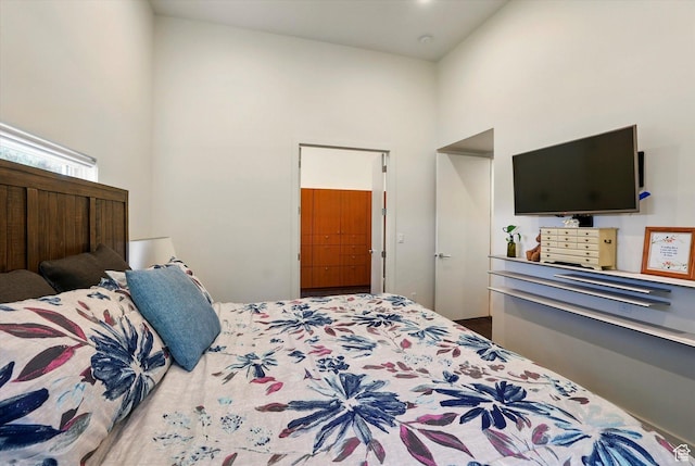 bedroom with a high ceiling