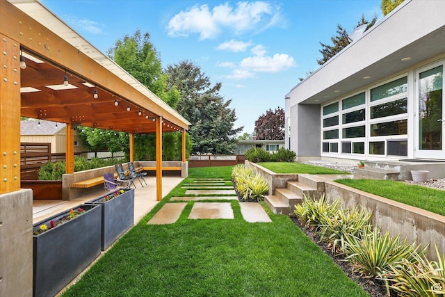 view of yard featuring a patio and a garden