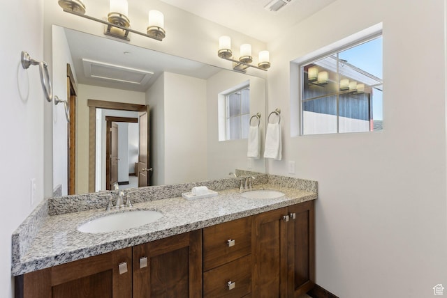bathroom featuring double vanity