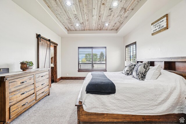 1236 S 2240 E, Heber City, UT 84032 - bedroom featuring a barn door, a raised ceiling, light carpet, wood ceiling, and recessed lighting