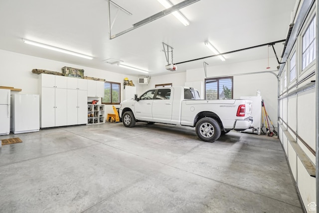 1236 S 2240 E, Heber City, UT 84032 - garage with fridge, freestanding refrigerator, and a garage door opener
