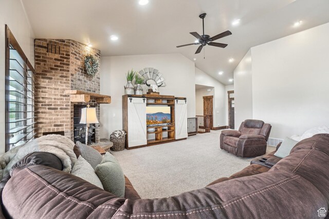 1236 S 2240 E, Heber City, UT 84032 - living room featuring carpet floors, lofted ceiling, a brick fireplace, a ceiling fan, and recessed lighting
