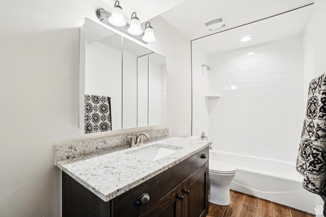 1236 S 2240 E, Heber City, UT 84032 - full bath with wood finished floors, toilet, vanity, and washtub / shower combination