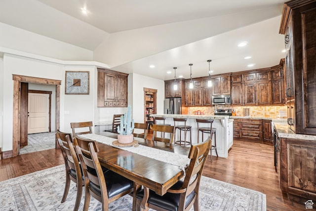 1236 S 2240 E, Heber City, UT 84032 - dining space featuring light wood-type flooring, vaulted ceiling, and recessed lighting