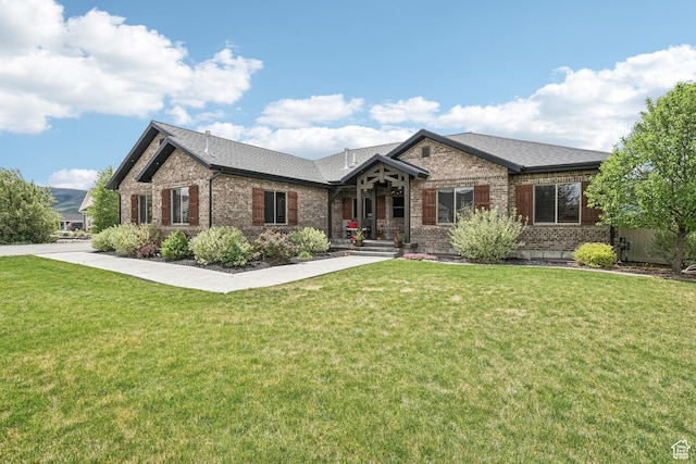 1236 S 2240 E, Heber City, UT 84032 - view of front of home with brick siding, a front lawn, and roof with shingles