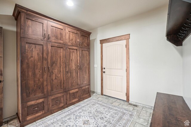 1236 S 2240 E, Heber City, UT 84032 - foyer featuring baseboards and light stone finish flooring