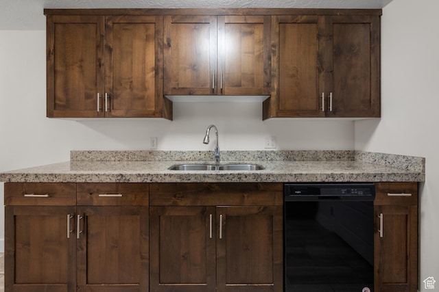 6594 S 1300 W, Taylorsville, UT 84123 - kitchen featuring black dishwasher, a sink, light stone countertops, and dark brown cabinetry