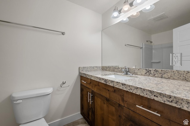 6594 S 1300 W, Taylorsville, UT 84123 - full bathroom with baseboards, toilet, vanity, and a shower