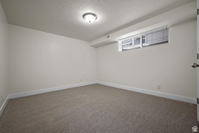 6594 S 1300 W, Taylorsville, UT 84123 - spare room featuring a textured ceiling, carpet flooring, and baseboards