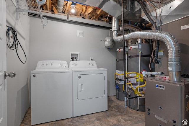 6594 S 1300 W, Taylorsville, UT 84123 - laundry room featuring washing machine and dryer and stone finish floors