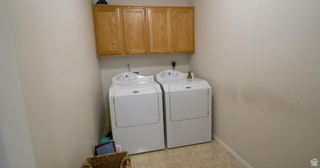 3139 N 800 E, North Ogden, UT 84414 - laundry room with cabinet space, washer and clothes dryer, and baseboards