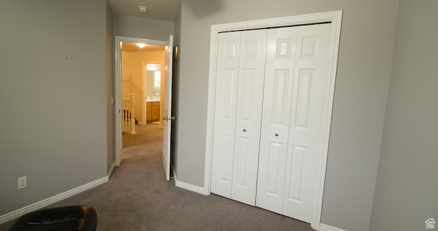 3139 N 800 E, North Ogden, UT 84414 - unfurnished bedroom with dark carpet, baseboards, and a closet
