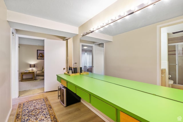 hallway featuring light wood-style flooring