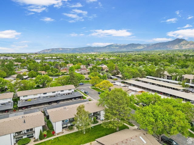 aerial view of residential area with a mountainous background
