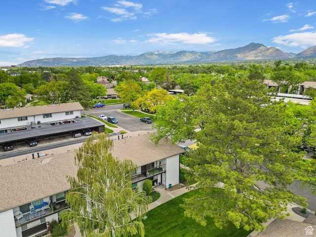 aerial view of residential area with mountains