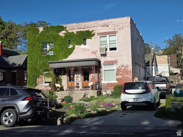 331 S 1000 E, Salt Lake City, UT 84102 - view of property with brick siding and cooling unit