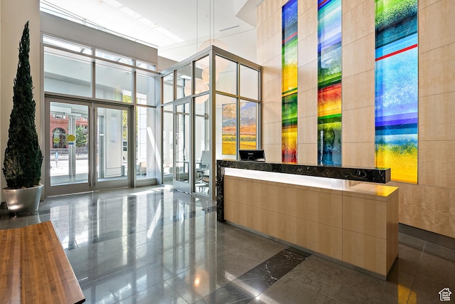 35 E 100 S Unit 507, Salt Lake City, UT 84111 - reception area with a high ceiling and expansive windows