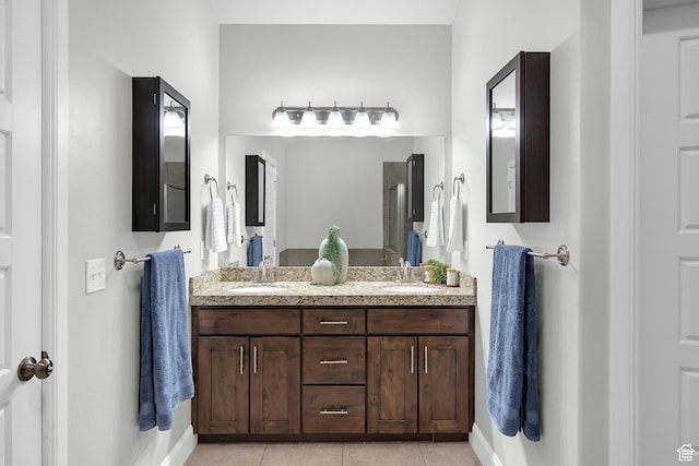 10926 N Marsala Dr, Highland, UT 84003 - bathroom with double vanity, tile patterned flooring, and baseboards