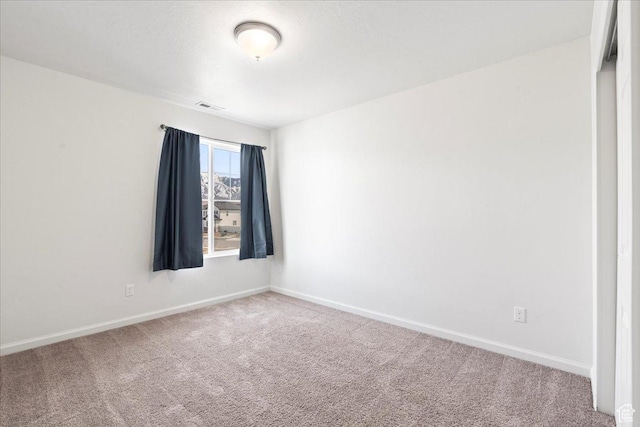 6405 N Appaloosa Dr, Stansbury Park, UT 84074 - spare room with carpet and baseboards
