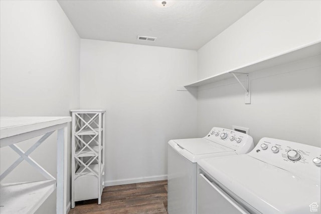 6405 N Appaloosa Dr, Stansbury Park, UT 84074 - washroom featuring washer and clothes dryer, dark wood-style floors, and baseboards