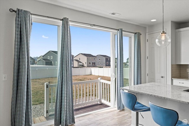 6405 N Appaloosa Dr, Stansbury Park, UT 84074 - dining area featuring light wood finished floors