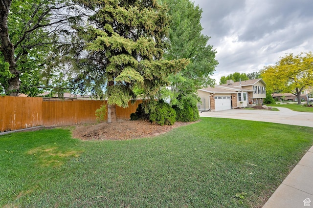 2298 W Jordan Meadows Cv, West Jordan, UT 84084 - view of front of home with concrete driveway and an attached garage