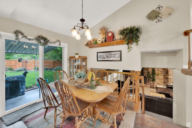2298 W Jordan Meadows Cv, West Jordan, UT 84084 - dining area with lofted ceiling and a chandelier