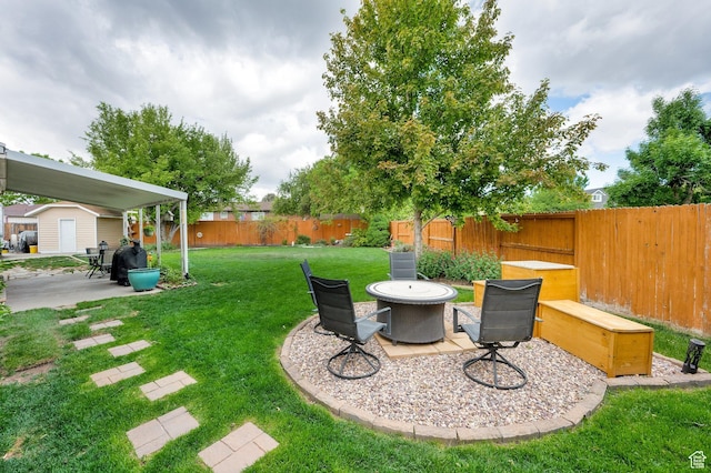 2298 W Jordan Meadows Cv, West Jordan, UT 84084 - view of yard featuring a patio area, a shed, and an outbuilding