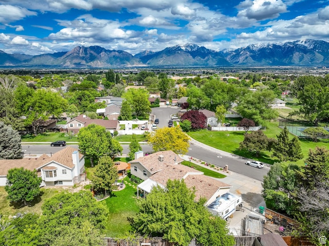 2298 W Jordan Meadows Cv, West Jordan, UT 84084 - aerial view of residential area featuring a mountain backdrop