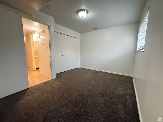 136 E 400 N Unit 108, Provo, UT 84606 - unfurnished bedroom with carpet floors, baseboards, and a closet