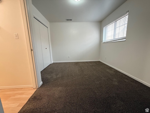 136 E 400 N Unit 108, Provo, UT 84606 - unfurnished bedroom with baseboards, a closet, and carpet