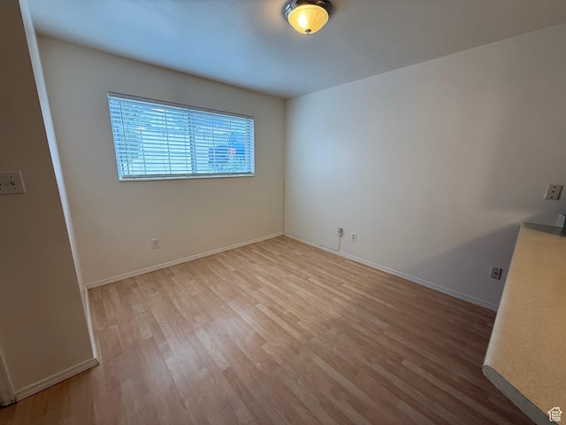 136 E 400 N Unit 108, Provo, UT 84606 - unfurnished room with wood finished floors and baseboards