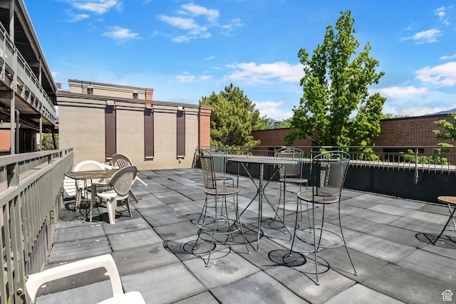 view of patio featuring outdoor dining area