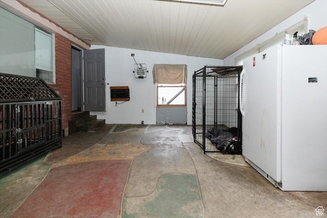 interior space with unfinished concrete floors