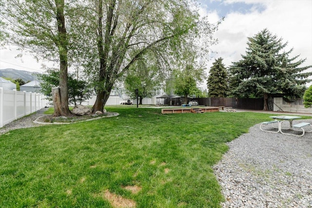 view of yard featuring a deck